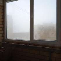 Окно балконное со стеклом, козырьком и водоотливом, в Ульяновске