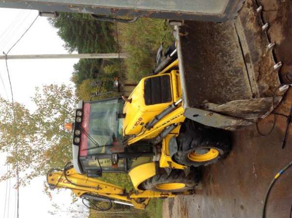 Экскаватор погрузчик New Holland LB110 2006г в Москве