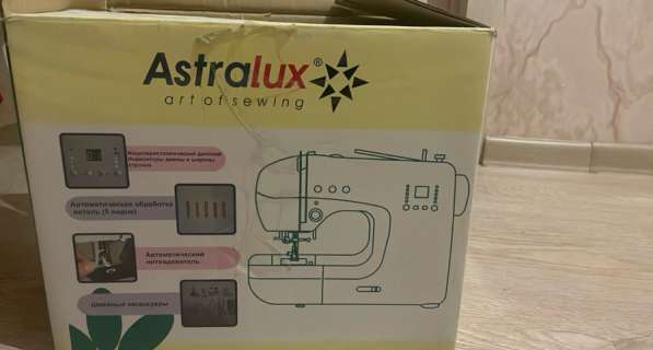 Электрическая швейная машинка