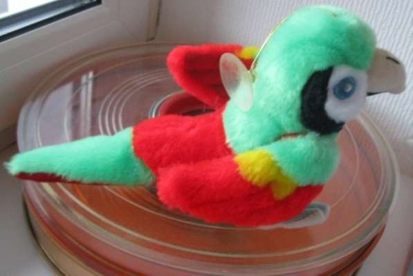 Мягкая игрушка красивый яркий попугай в Сыктывкаре