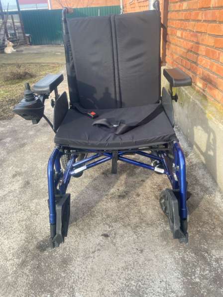 Инвалидная коляска на электроприводе