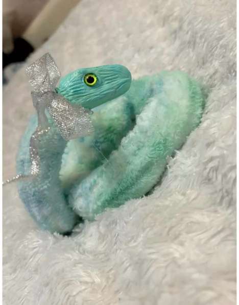 Подвижная игрушка змея