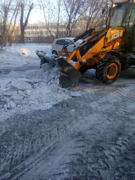 Аренда трактора погрузчика. Уборка чистка и вывоз снега в Екатеринбурге фото 12